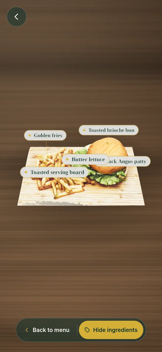 The placed dish on a table with gold callouts naming each ingredient